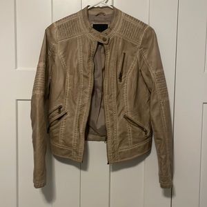 Maurice’s tan jacket